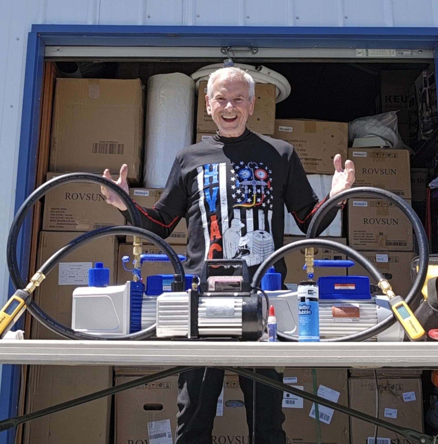 Jon Hughes with professional mini-split vacuum equipment
